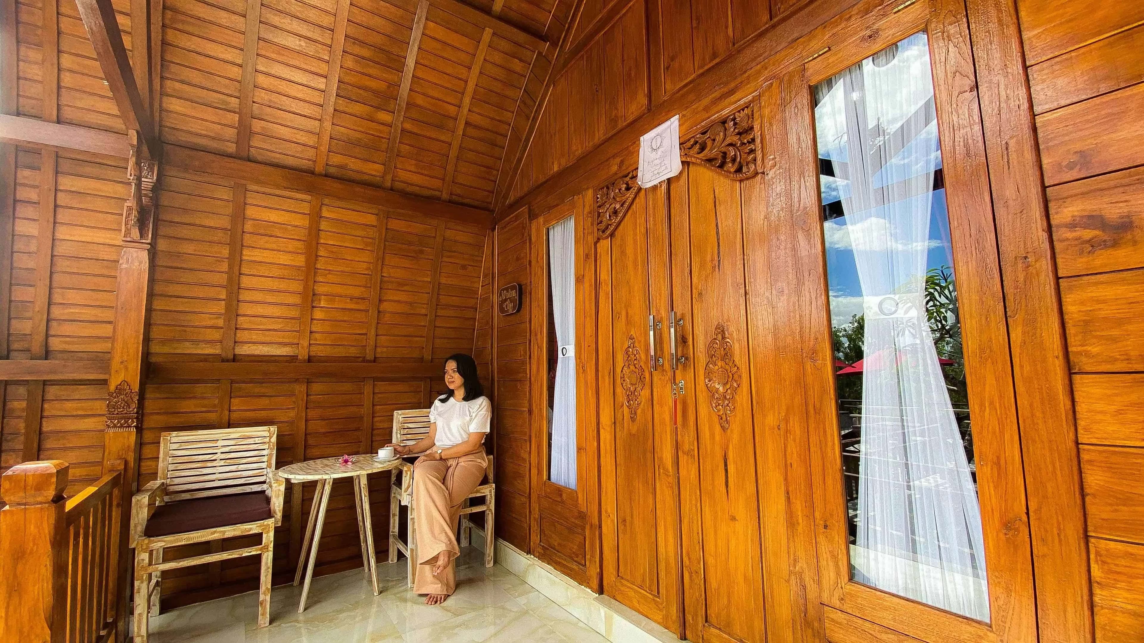 Traditional Joglo wooden terrace with sitting area